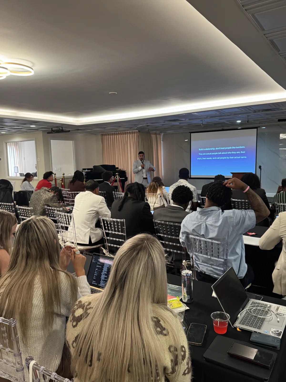 Team members attending a training presentation