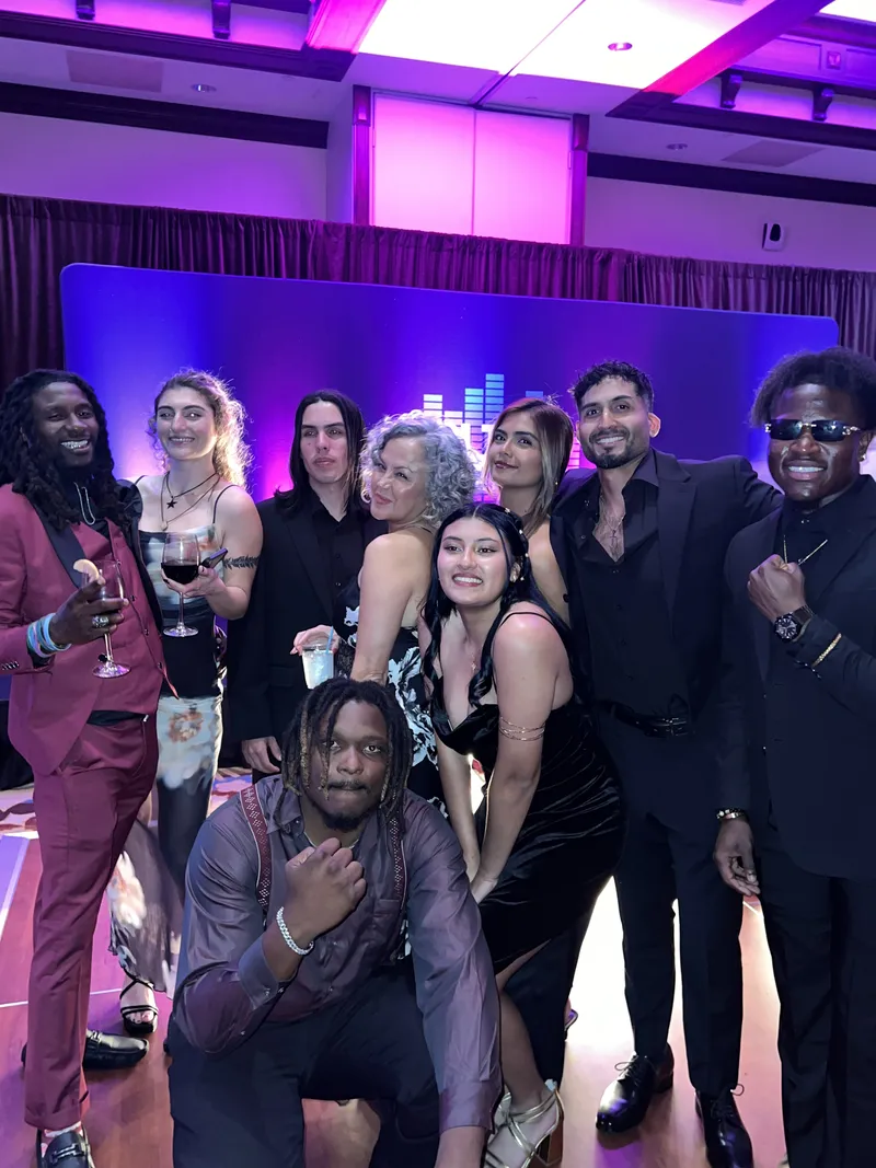 Team celebrating at a gala night